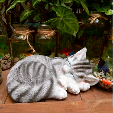 Statue de chat qui dort mignon